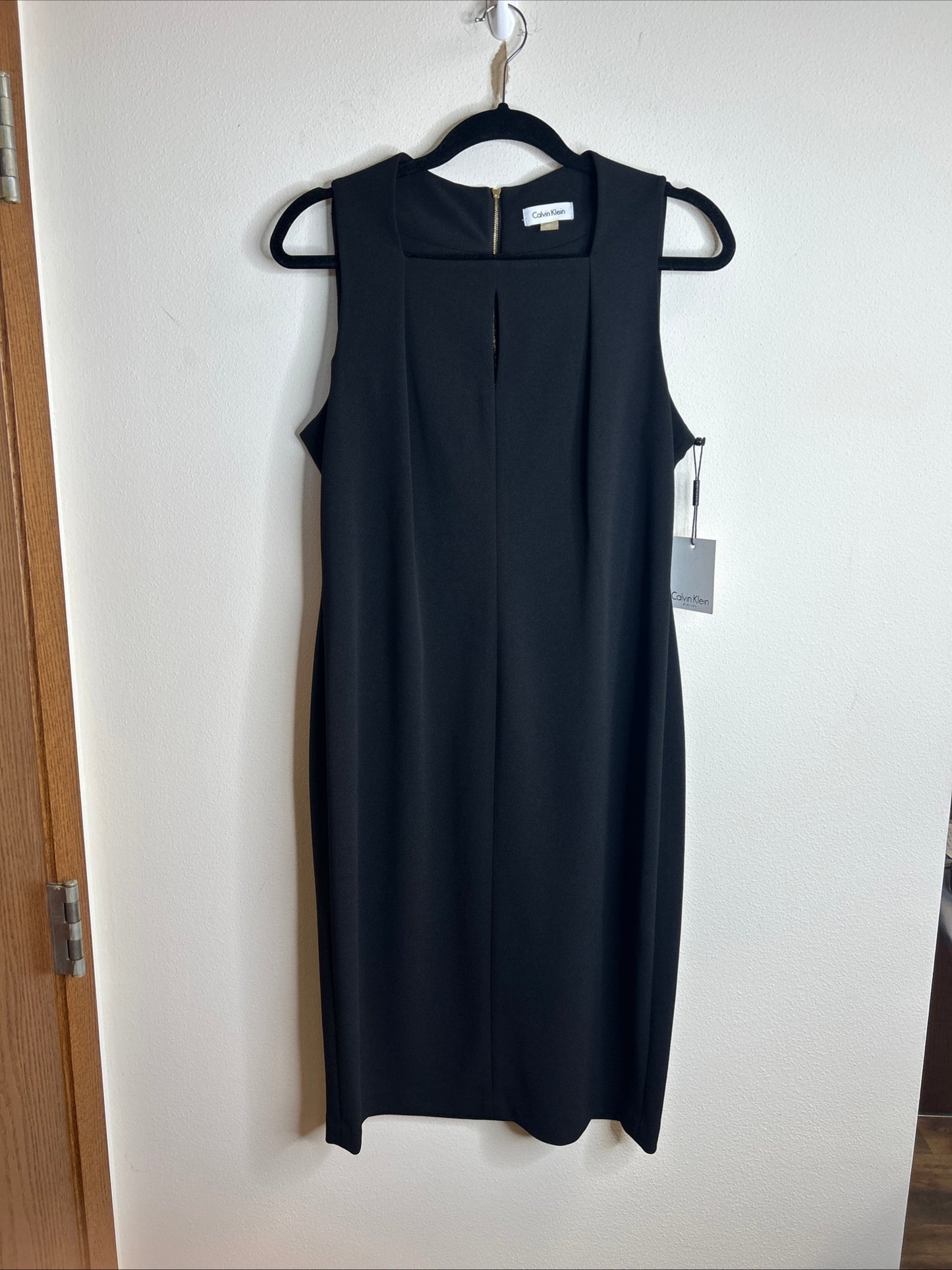 Chic and timeless black midi dress by Calvin Klein size 12