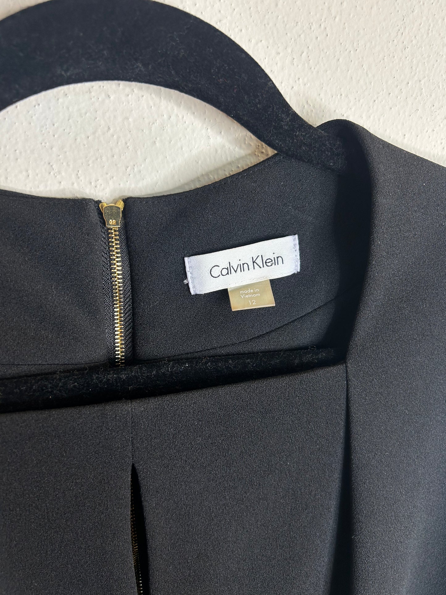 Chic and timeless black midi dress by Calvin Klein size 12