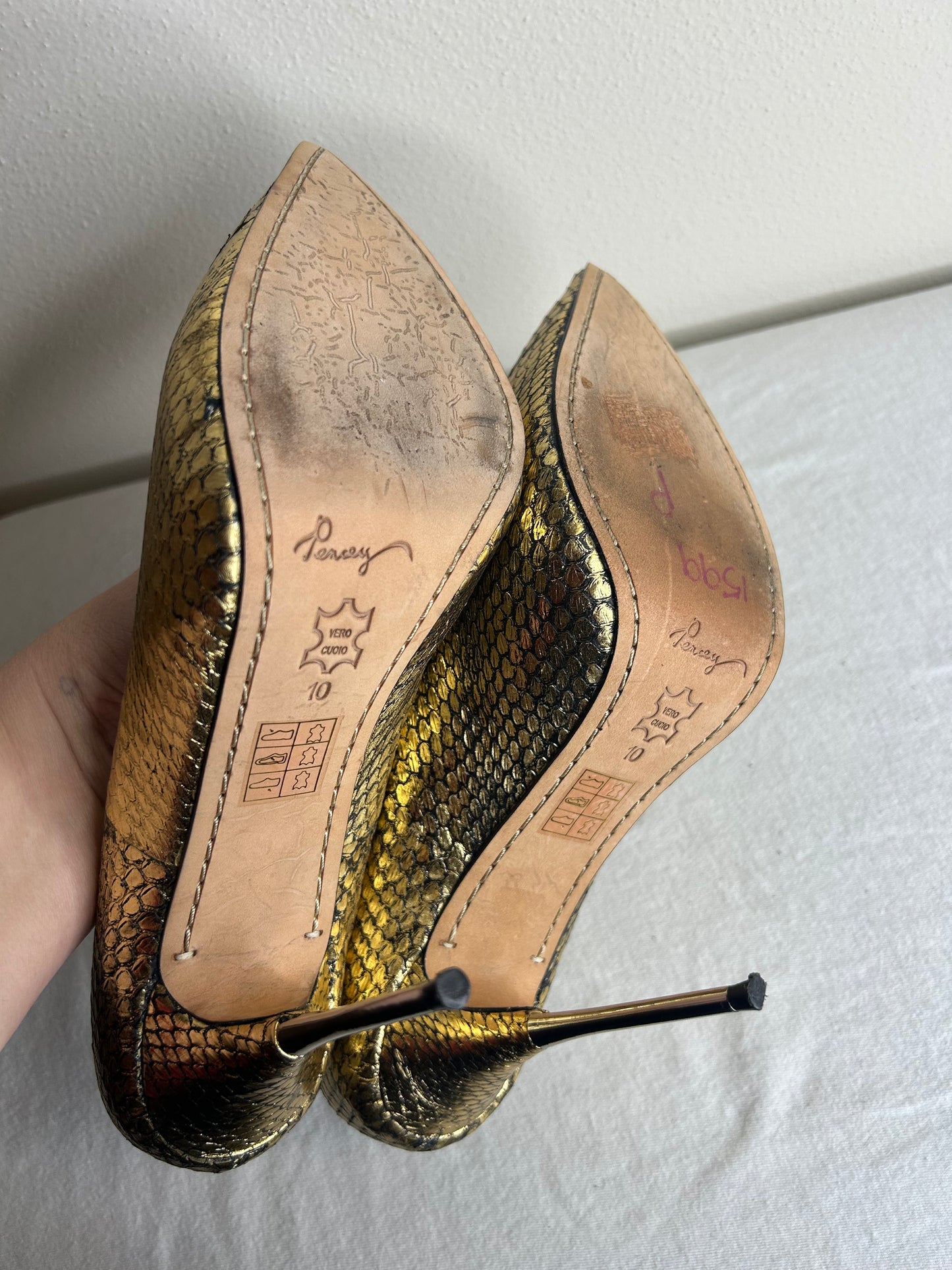 Pencey stiletto heels with a bow accent. Womens size 10