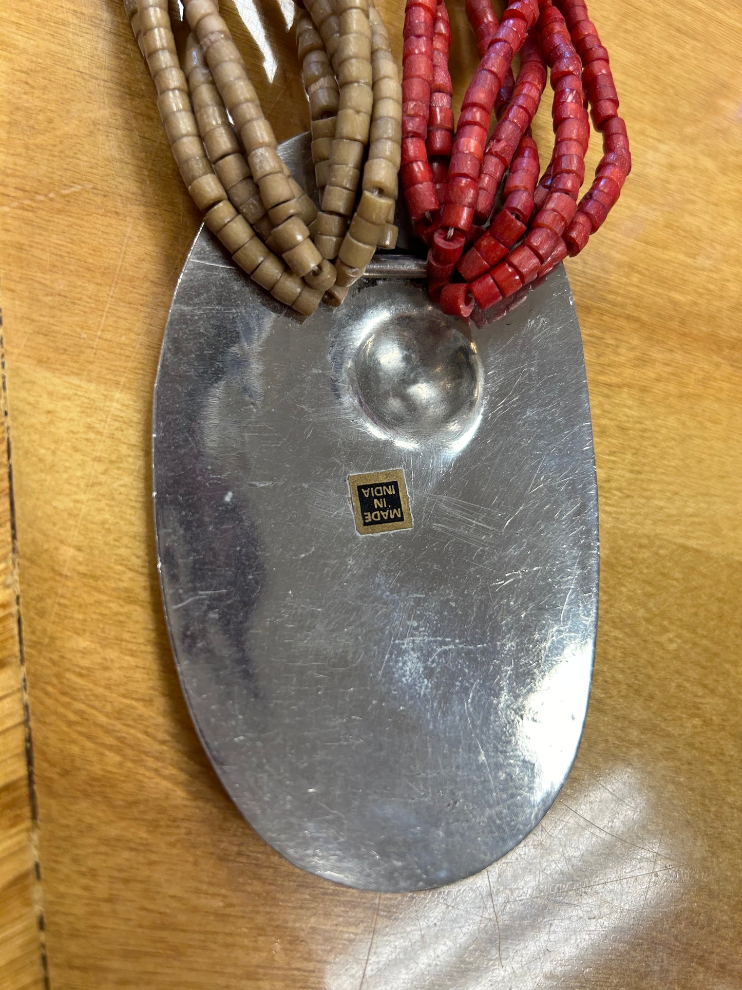 Vintage Indian beaded necklace with large metal pendant
